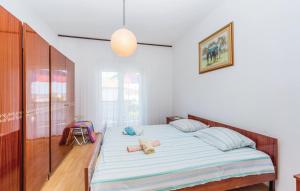 Postel nebo postele na pokoji v ubytování apartman Danijela