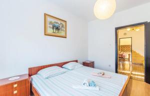 Postel nebo postele na pokoji v ubytování apartman Danijela