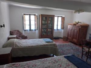 Posteľ alebo postele v izbe v ubytovaní Maison de caractère