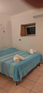 Posteľ alebo postele v izbe v ubytovaní Room Calafatari