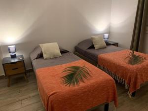 Ένα ή περισσότερα κρεβάτια σε δωμάτιο στο Villa Morene +39 φωτογραφίες