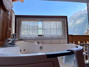 Vannituba majutusasutuses Chalet Hotel Adler