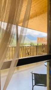 A balcony or terrace at Vache Hotel