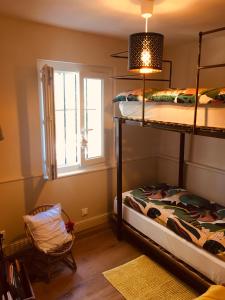 Postel nebo postele na pokoji v ubytování Bastide Sainte Trinide