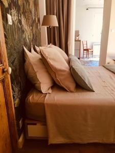 Postel nebo postele na pokoji v ubytování Bastide Sainte Trinide