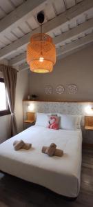 מיטה או מיטות בחדר ב-La Finca III