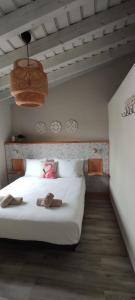 מיטה או מיטות בחדר ב-La Finca III