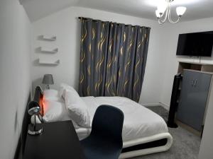 Postel nebo postele na pokoji v ubytování Cozzy Accommodation