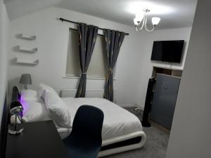 Postel nebo postele na pokoji v ubytování Cozzy Accommodation