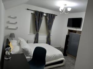 Postel nebo postele na pokoji v ubytování Cozzy Accommodation