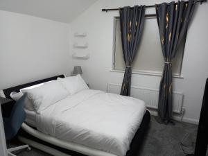 Postel nebo postele na pokoji v ubytování Cozzy Accommodation