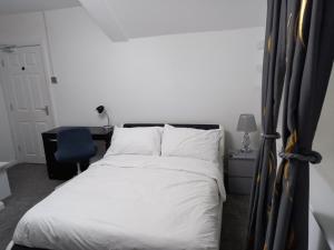 Postel nebo postele na pokoji v ubytování Cozzy Accommodation