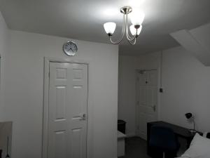 Postel nebo postele na pokoji v ubytování Cozzy Accommodation
