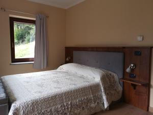 Postel nebo postele na pokoji v ubytování Al Drit