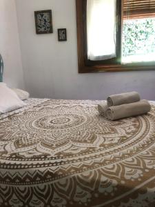 A bed or beds in a room at Alhambra en el Sacromonte