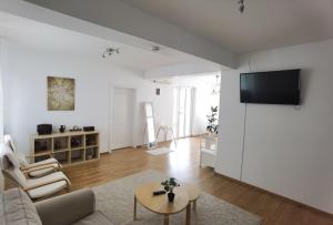 TV a/nebo společenská místnost v ubytování Casa Reds