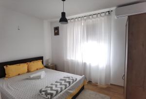Postel nebo postele na pokoji v ubytování Casa Reds