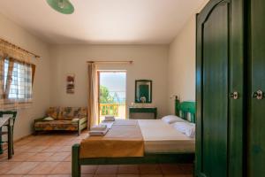 Postel nebo postele na pokoji v ubytování Golden Sun Apartments