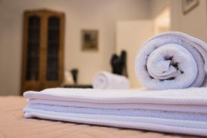 A bed or beds in a room at Casa Reale Corfu