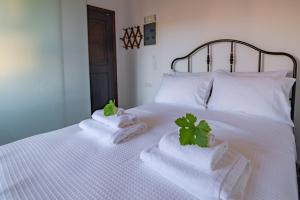 Posteľ alebo postele v izbe v ubytovaní Marthas DeLight Rooms