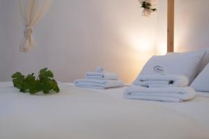 Posteľ alebo postele v izbe v ubytovaní Marthas DeLight Rooms