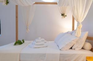 Posteľ alebo postele v izbe v ubytovaní Marthas DeLight Rooms