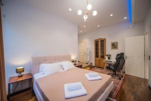 A bed or beds in a room at Casa Reale Corfu