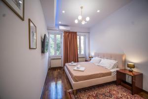 A bed or beds in a room at Casa Reale Corfu