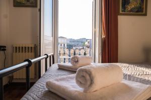 A bed or beds in a room at Casa Reale Corfu