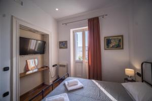 A bed or beds in a room at Casa Reale Corfu