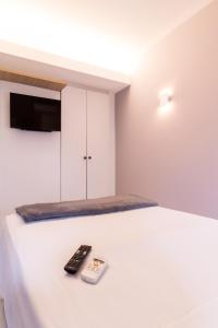 Телевизор и/или развлекательный центр в Ilhasul Hotel Residencia
