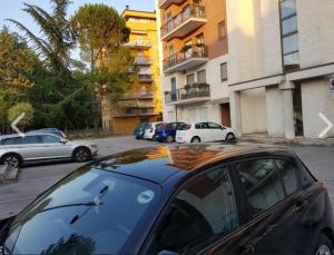 Budova, kde se aparthotel nachází + 2 fotografie
