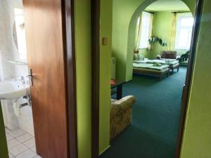 Postel nebo postele na pokoji v ubytování Hotel Jaro