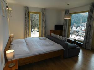 Postel nebo postele na pokoji v ubytování Penzion Eden