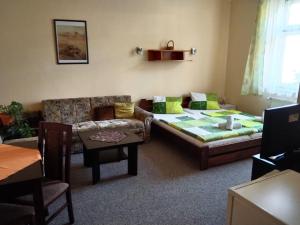 Postel nebo postele na pokoji v ubytování Hotel Jaro