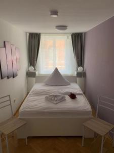 Postel nebo postele na pokoji v ubytování Ferienwohnung Nikolaiblick