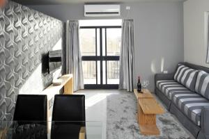 Χώρος καθιστικού στο Hillel 11 Hotel