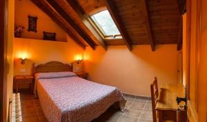 A bed or beds in a room at Casa Cuevas