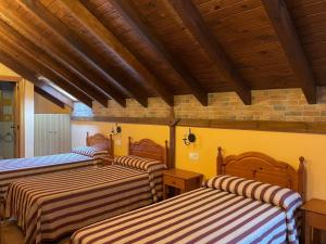 A bed or beds in a room at Casa Cuevas