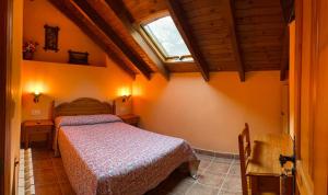 A bed or beds in a room at Casa Cuevas