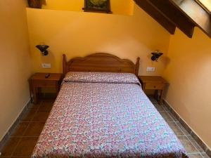 A bed or beds in a room at Casa Cuevas