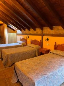 A bed or beds in a room at Casa Cuevas