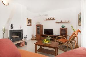 TV a/nebo společenská místnost v ubytování Guest House Loranum