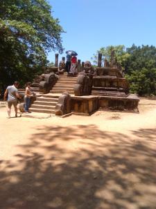 a group of people standing on steps in a park at Villa77 in Polonnaruwa