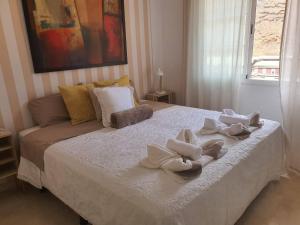 Fotografia z galérie ubytovania Fantástico ático con Jacuzzi y preciosa terraza v destinácii Puerto Rico de Gran Canaria