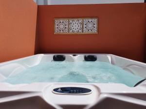 Fotografia z galérie ubytovania Fantástico ático con Jacuzzi y preciosa terraza v destinácii Puerto Rico de Gran Canaria
