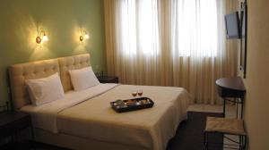 Un pat sau paturi într-o cameră la Salvia