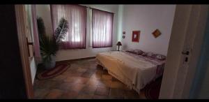Ένα ή περισσότερα κρεβάτια σε δωμάτιο στο Nakupenda Apartments