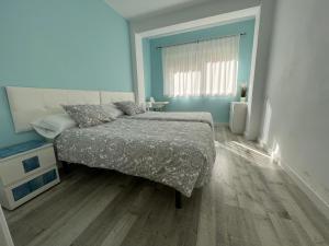 Voodi või voodid majutusasutuse Apartamento Caleta toas