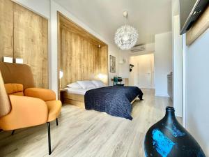 Postel nebo postele na pokoji v ubytování Apartments and Rooms Mateša
